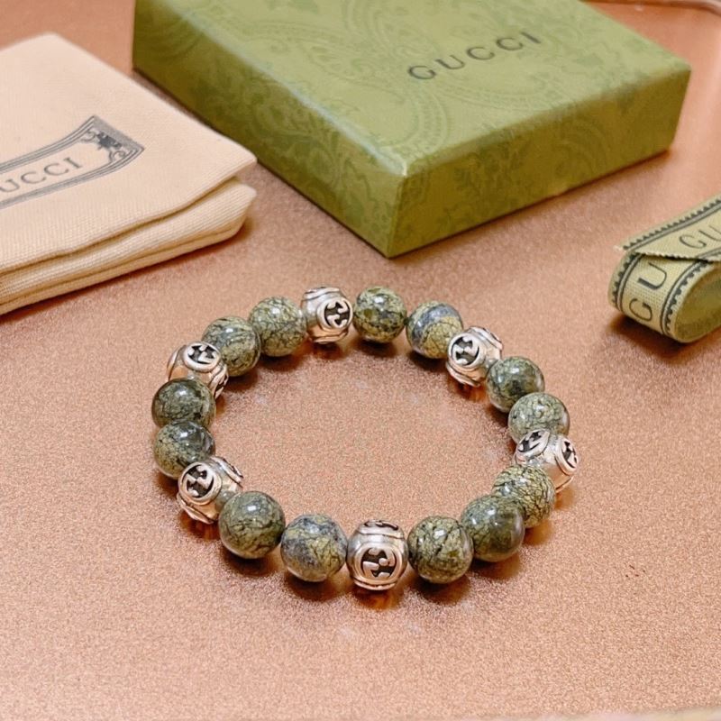 G*u*i bracelets
